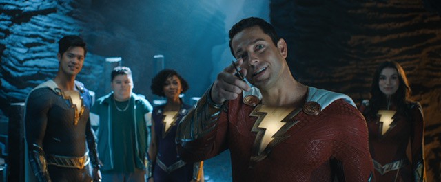 Zachary Levi in Shazam outfit with his foster siblings