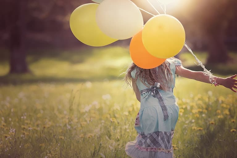 Mental Health in children - girl with balloons