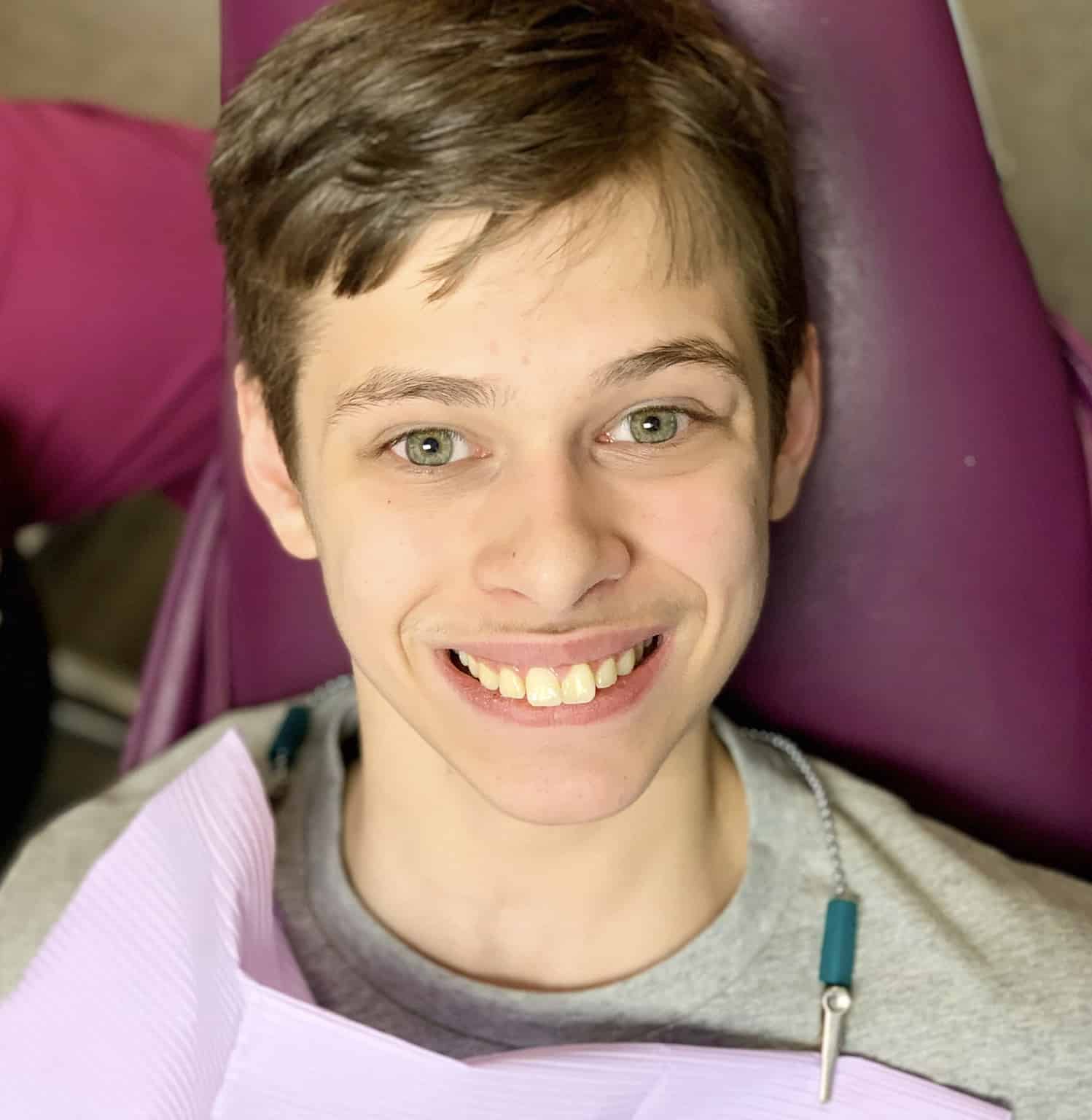 After the teeth are cleaned at the dentist - boy in chair