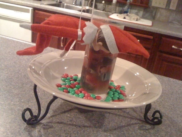 Elf on the Shelf by the M&M bowl