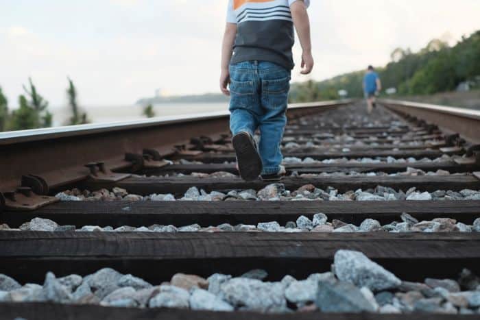 Kids on train tracks. Raising kids who trust you.