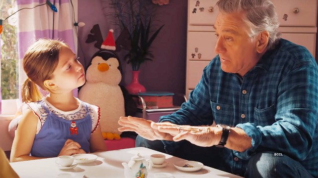 Robert De Niro stars in the War with Grandpa having a tea party with his granddaughter
