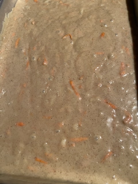 carrot cake batter in a pan
