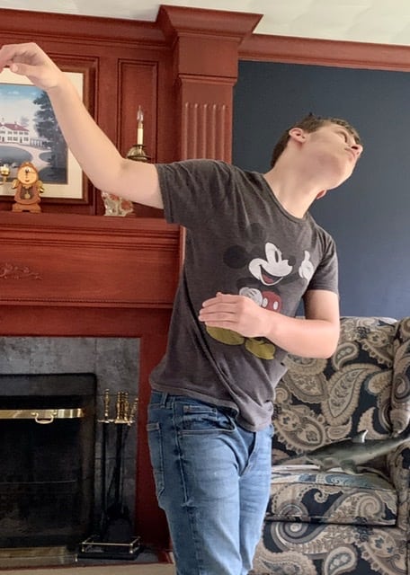 boy dancing in family room