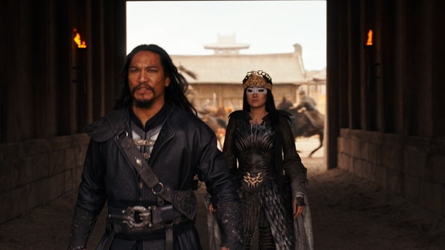 Jason Scott Lee as Bori Khan and Gong Li in Disney Mulan