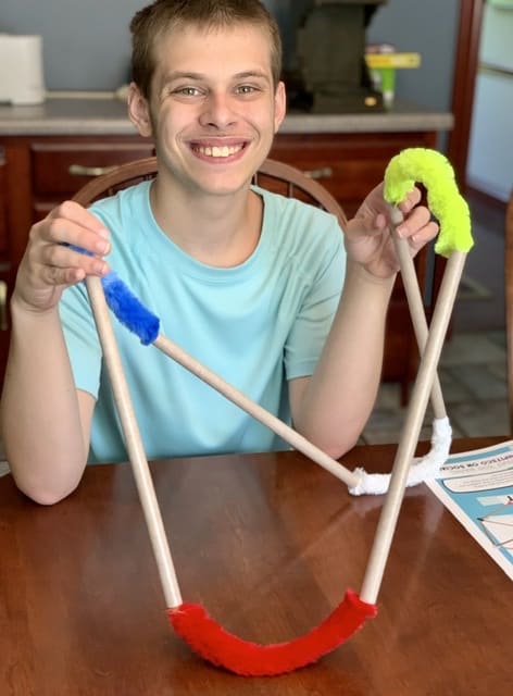 boy making structures at home