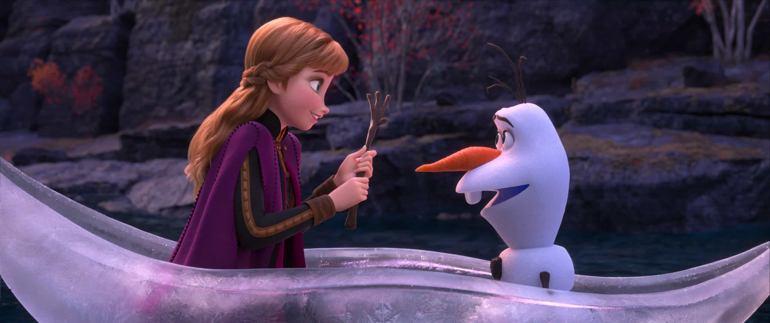Anna and Olaf in a boat made of ice