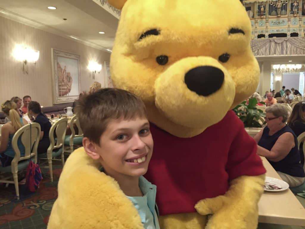 Winnie the pooh and young boy