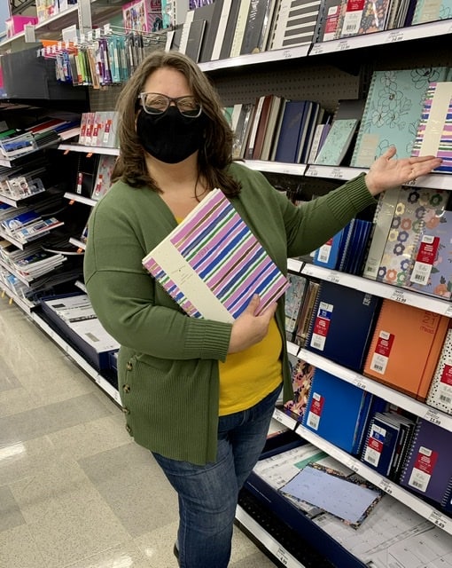 woman with mask at Meijers with planners