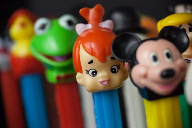 Mickey Mouse, Pebbles from the Flintstones, Kermit the frog pez dispensers