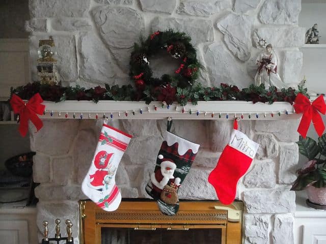 Christmas stockings hung by the chimney