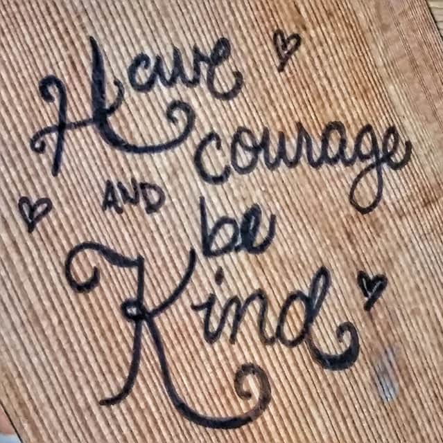 Graphic that reads Have courage and be kind with hearts around it