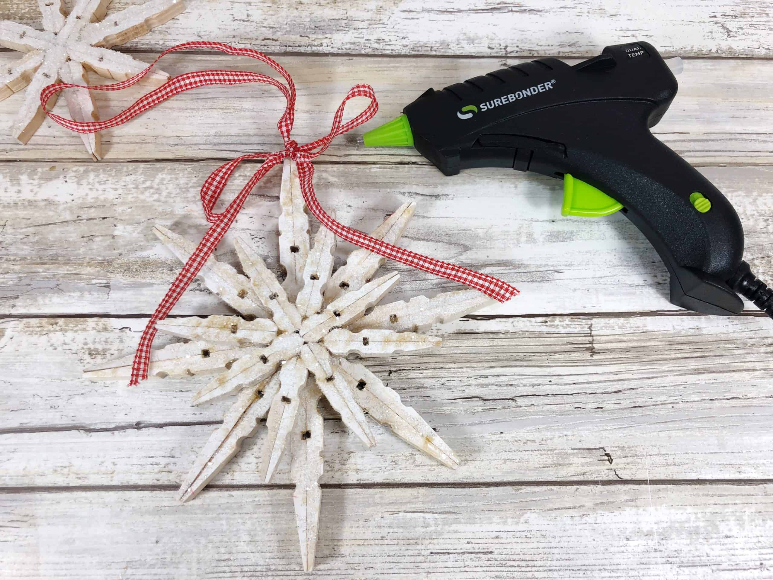 Attaching ribbon snowflake and hot glue gun