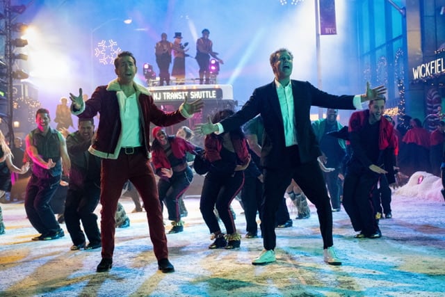 Ryan Reynolds and Will Ferrell dancing in Spirited