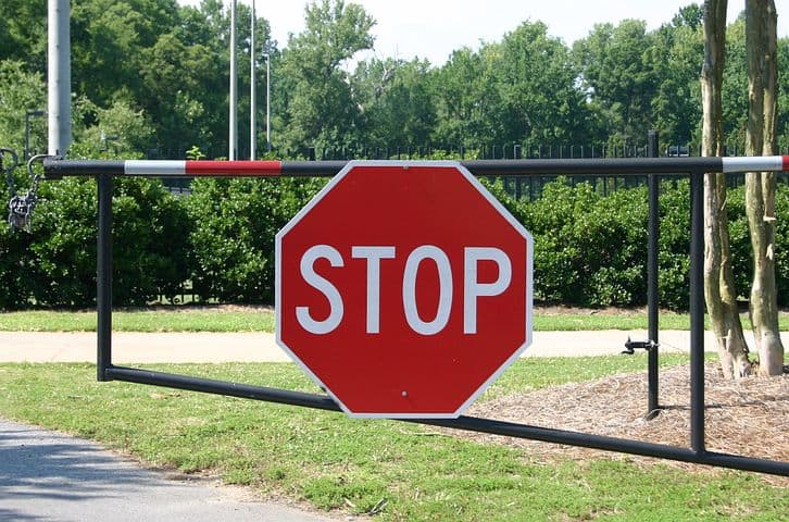 Stop sign on a gate