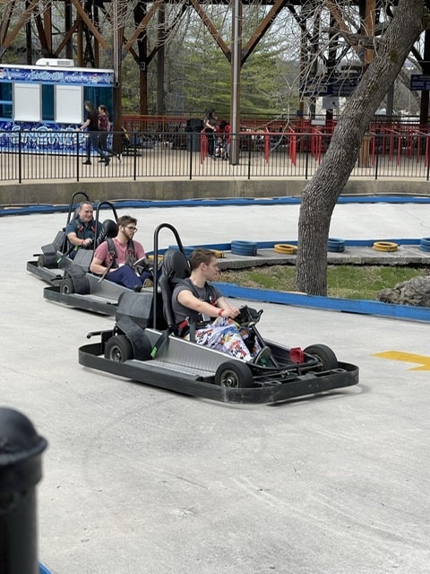 Three go-karts at tracks family fun park