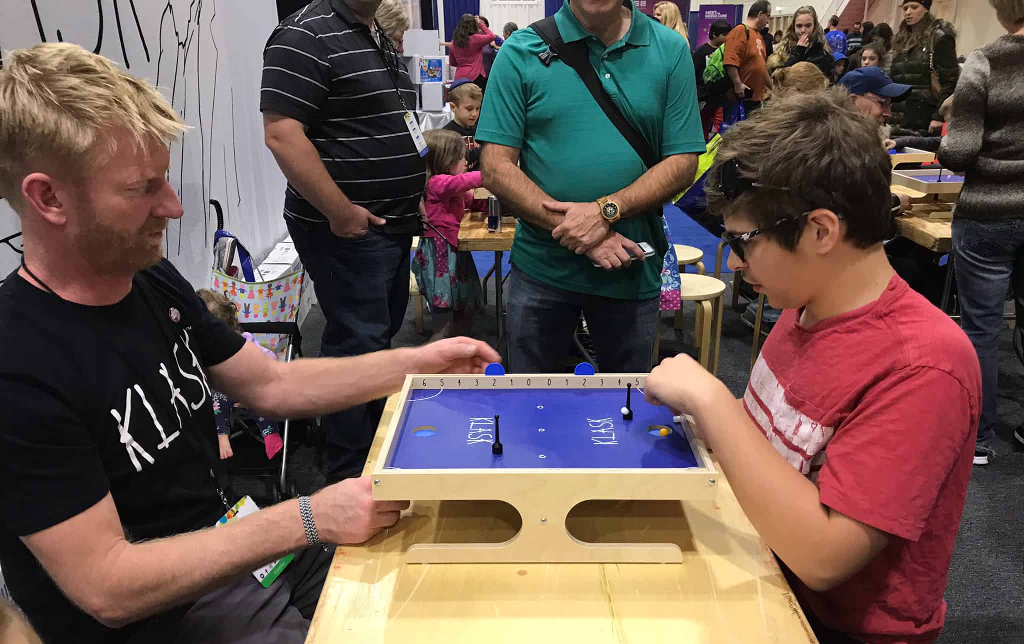 Playing the game of Klask at the Chicago Toy and Game Fair