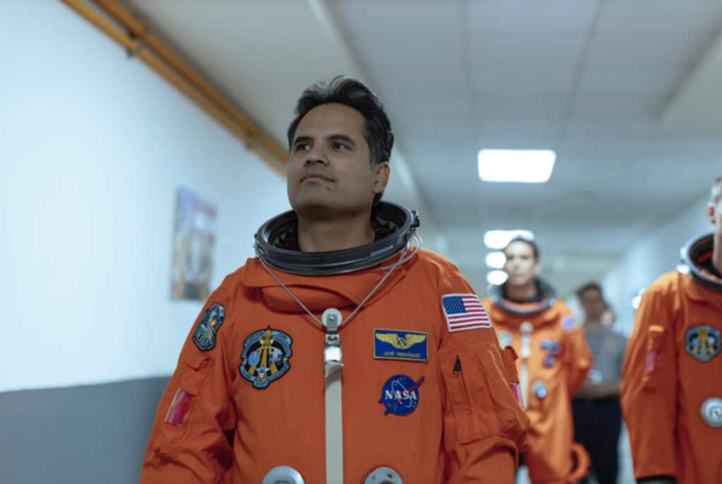 Michael Pena in an astroanut suit in the Amazon Prime Video entitled A Million Miles Away