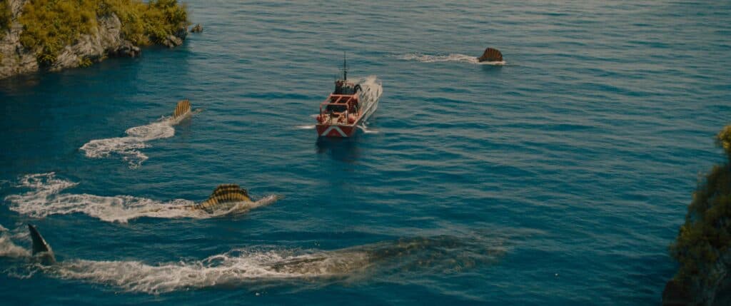 Dinosaur sea creatures circle a boat in Jurassic World Rebirth