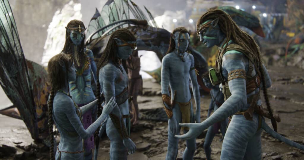Jake Sully talks with his family in Avatar The Way of Water. This is the second Avatar movie and was released into theaters on December 16, 2022.