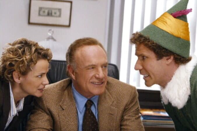 Will Ferrell as Buddy the Elf with his Father, Walter Hobbs, in his office.